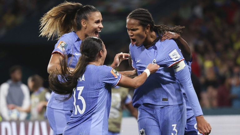 France's Wendie Renard, right, celebrates with teammates after scoring her team's second goal during the Women's World Cup Group F soccer match between France and Brazil in Brisbane, Australia. (Aisha Schulz/AP)