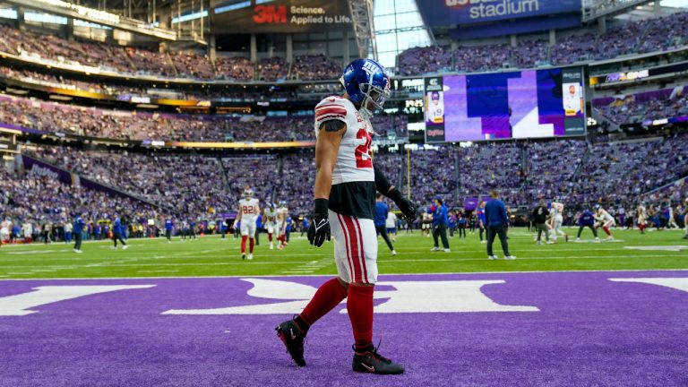 New York Giants' Saquon Barkley warms up before an NFL wild card football game against the Minnesota Vikings Sunday, Jan. 15, 2023, in Minneapolis. (Abbie Parr/AP)