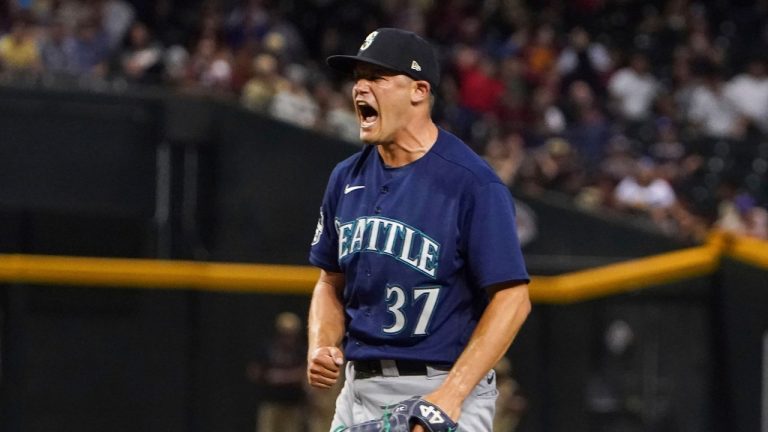 Seattle Mariners pitcher Paul Sewald celebrates striking out Arizona Diamondbacks' Christian Walker for the final out of a baseball game Friday, July 28, 2023, in Phoenix. The Mariners won 5-2. (Darryl Webb/AP Photo)