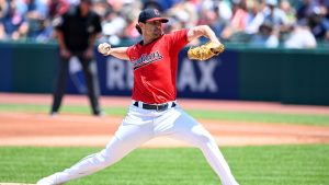 Cleveland Guardians starting pitcher Shane Bieber delivers during the first inning of a baseball game against the Kansas City Royals. (Nick Cammett/AP)