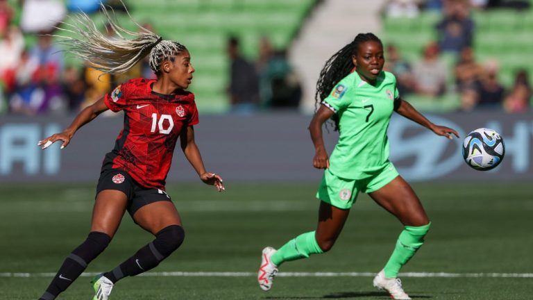 Canada's Ashley Lawrence, left, and Nigeria's Antionette Payne battle fort the ball during the Women's World Cup Group B soccer match between Nigeria and Canada in Melbourne, Australia, Friday, July 21, 2023. (Hamish Blair/AP Photo)