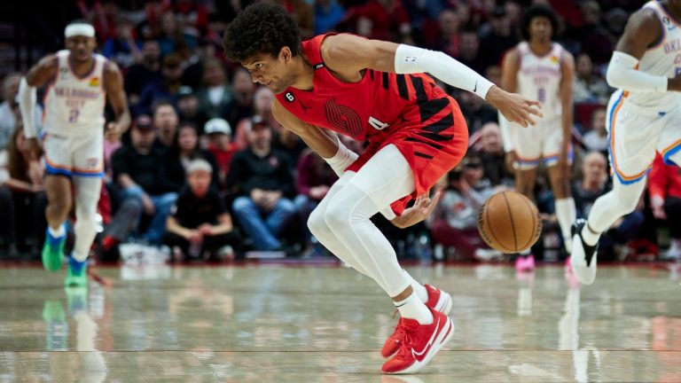 Portland Trail Blazers guard Matisse Thybulle saves the ball from going out of bounds against the Oklahoma City Thunder during the second half of an NBA basketball game in Portland, Ore., Sunday, March 26, 2023. (Craig Mitchelldyer/AP Photo)