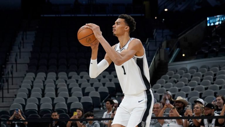 San Antonio Spurs' Victor Wembanyama, the No. 1 draft pick, shoots during an NBA basketball press conference, Saturday, June 24, 2023, at the AT&T Center in San Antonio. (Eric Gay/AP Photo)