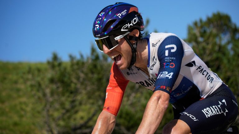 Canada's Michael Woods wins the ninth stage of the Tour de France cycling race over 182.5 kilometers (113.5 miles) with start in Saint-Leonard-de-Noblat and finish in Puy de Dome, France, Sunday, July 9, 2023. (Daniel Cole/AP)