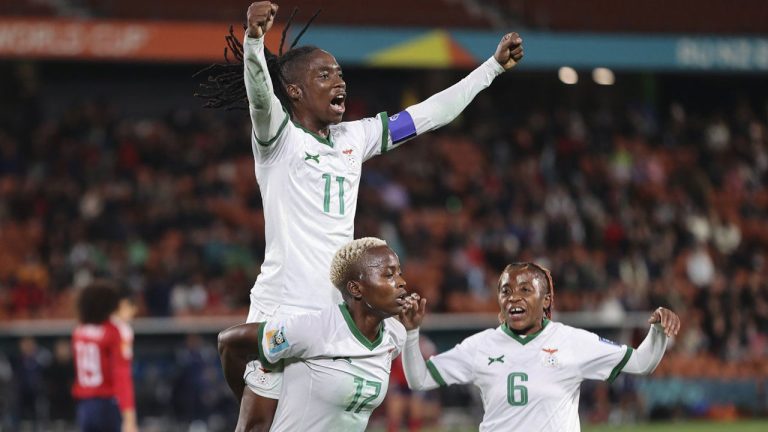 Goal scorer Zambia's Racheal Kundananji carries teammate Barbra Banda as Mary Wilombe, right, runs in as they celebrate their third goal during the Women's World Cup Group C soccer match between Costa Rica and Zambia in Hamilton, New Zealand. (Juan Mendez/AP)