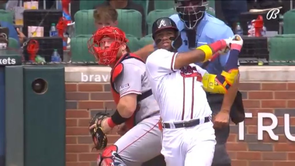 Watch: Fans run on field, collide with Braves star Ronald Acuna Jr