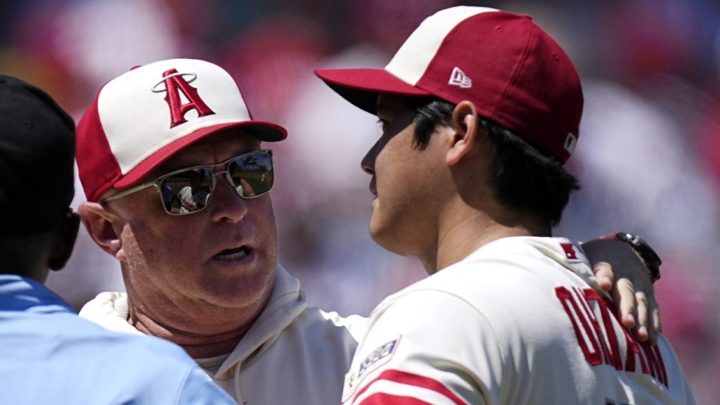 Los Angeles Angels' Shohei Ohtani is shown in western garb during his  as-bat as the Angels celebrate their Country Weekend promotion during the  first inning of a baseball game against the Minnesota