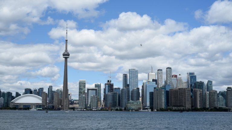 A view of the downtown Toronto skyline from a Toronto Islands ferry in Toronto, Ontario on July 25, 2022. (Don Denton/CP)