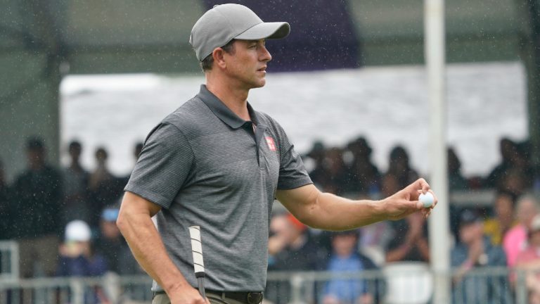 Adam Scott, of Australia, reacts after his putt on the ninth hole during the first round of the Wyndham Championship golf tournament in Greensboro, N.C., Thursday, Aug. 3, 2023. (Chuck Burton/AP)