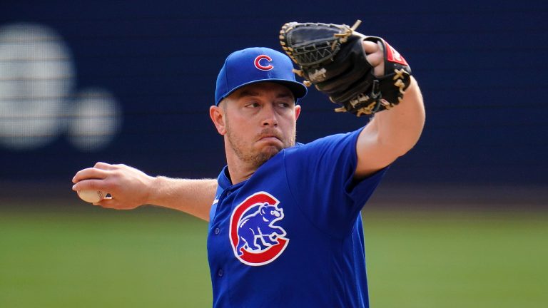 Adrian Sampson pitches during the second inning of the Chicago Cubs' game against the Pittsburgh Pirates in Pittsburgh, Sunday, Sept. 25, 2022. (Gene J. Puskar/AP)