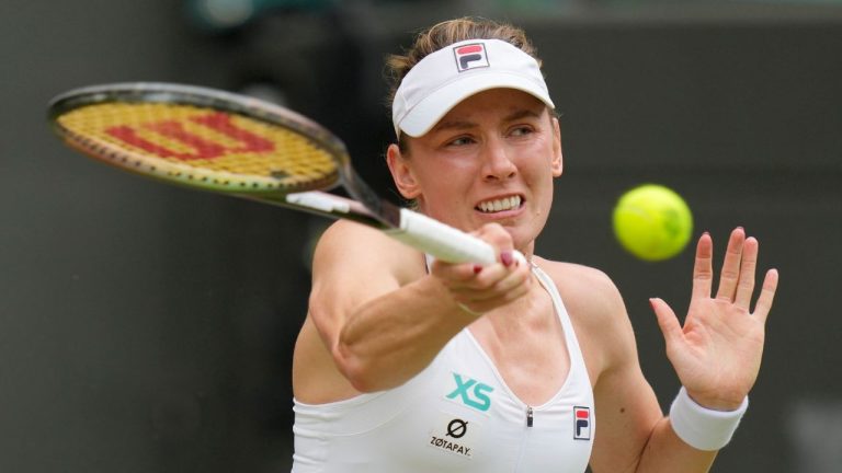 Russia's Ekaterina Alexandrova in action against Aryna Sabalenka of Belarus during their women's singles match on day eight of the Wimbledon tennis championships in London, Monday, July 10, 2023. (Kirsty Wigglesworth/AP Photo)