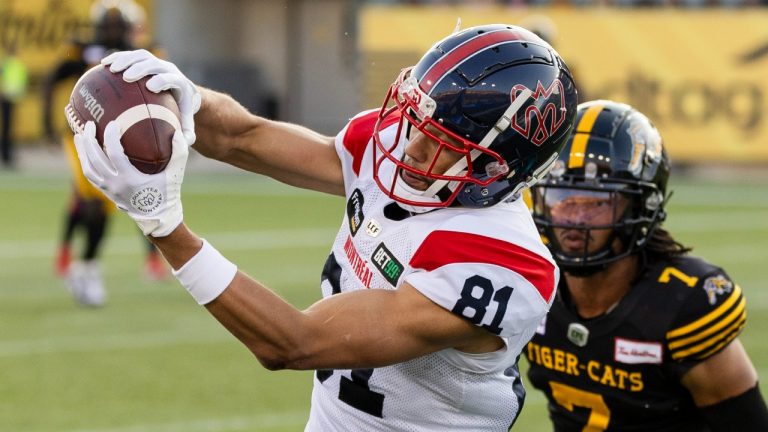 Montreal Alouettes wide receiver Austin Mack (81) makes a catch during first half CFL football game action against the Hamilton Tiger-Cats. (Nick Iwanyshyn/CP)