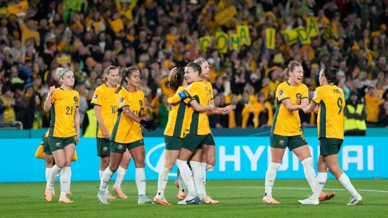 Australia's players celebrate after Hayley Raso scored the second goal during the Women's World Cup round of 16 soccer match between Australia and Denmark at Stadium Australia in Sydney, Australia, Monday, Aug. 7, 2023. (Rick Rycroft/AP)