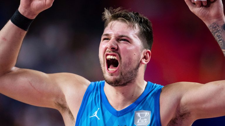 Slovenia's Luka Doncic reacts during the Eurobasket group B basketball match between France and Slovenia in Cologne, Germany, Wednesday Sept. 7, 2022. (Marius Becker/dpa via AP) 