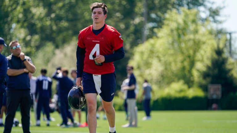 Quarterback Reece Udinski (4) jogs off the field after the Seattle Seahawks' rookie minicamp, Friday, May 12, 2023, in Renton, Wash. (AP)