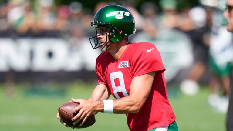 New York Jets quarterback Aaron Rodgers participates in a drill during a practice at the NFL football team's training facility in Florham Park, N.J., Sunday, July 30, 2023. (Seth Wenig/AP) 