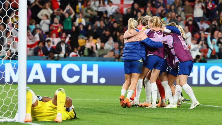 England's Chloe Kelly, center, celebrates after scoring the last goal during a penalty shootout at the Women's World Cup round of 16 soccer match against Nigeria in Brisbane, Australia, Monday, Aug. 7, 2023. (AP)