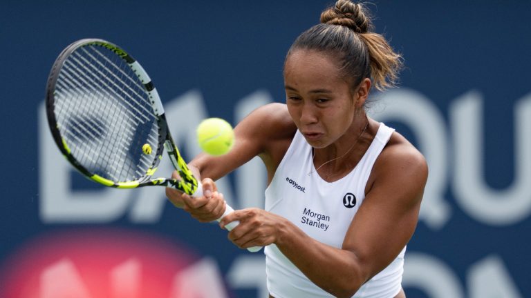 Leylah Fernandez of Canada hits a return to Peyton Stearns of the United States, during the National Bank Open tennis tournament in Montreal, Tuesday, August 8, 2023. (Christinne Muschi/CP)