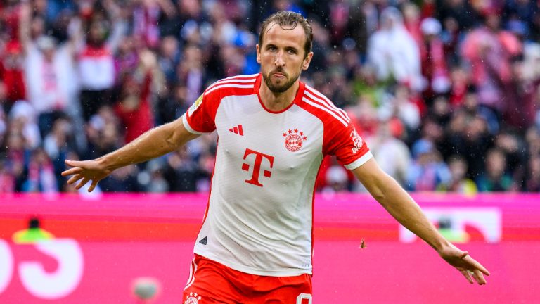 Munich's Harry Kane celebrates scoring, during the German Bundesliga soccer match between Bayern Munich and FC Augsburg, at the Allianz Arena, in Munich, Germany, Sunday, Aug. 27, 2023. (Tom Weller/dpa via AP) 