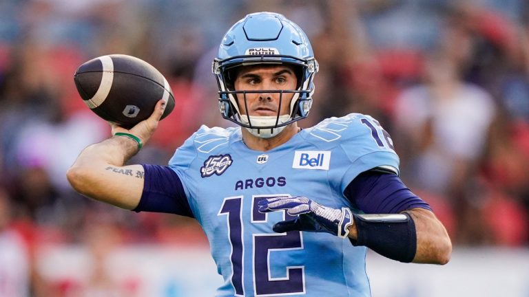 Toronto Argonauts quarterback Chad Kelly (12) throws against the Ottawa Redblacks during first half CFL football action in Toronto. (Andrew Lahodynskyj/CP)