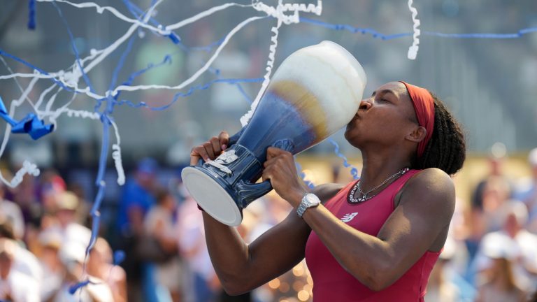 Coco Gauff, of the United States, kisses the Rookwood Cup after defeating Karolina Muchova, of the Czech Republic, in the women's singles final of the Western & Southern Open tennis tournament, Sunday, Aug. 20, 2023, in Mason, Ohio. (Aaron Doster/AP)