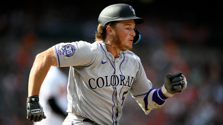 Colorado Rockies' Hunter Goodman runs to first on his single during the ninth inning of a baseball game against the Baltimore Orioles. (Nick Wass/AP)