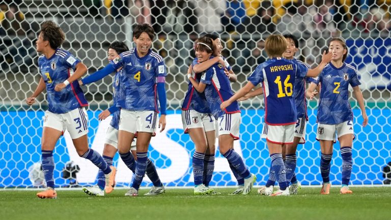 Japan's Hinata Miyazawa, center, celebrates with teammates after scoring the opening goal during the Women's World Cup Group C soccer match between Japan and Spain in Wellington, New Zealand, Monday, July 31, 2023. (John Cowpland/AP)