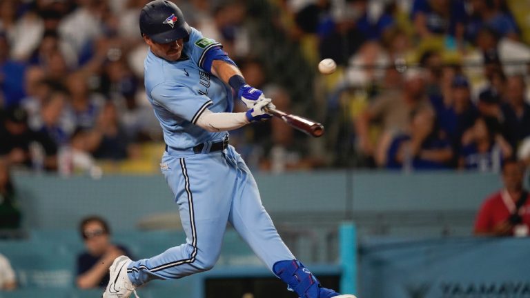 Toronto Blue Jays' Jordan Luplow hits a single against the Los Angeles Dodgers during the fourth inning of a baseball game Tuesday, July 25, 2023, in Los Angeles. (Ryan Sun/AP)