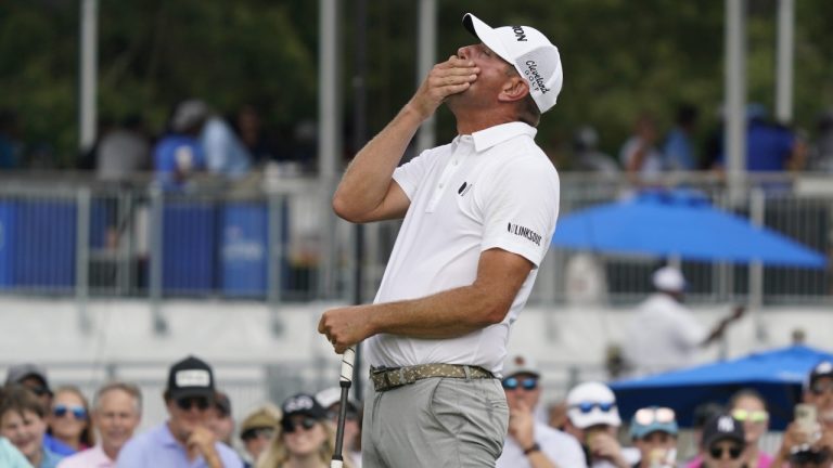 Lucas Glover reacts after his putt on the ninth hole during the final round of the Wyndham Championship golf tournament in Greensboro, N.C., Sunday, Aug. 6, 2023. (Chuck Burton/AP)