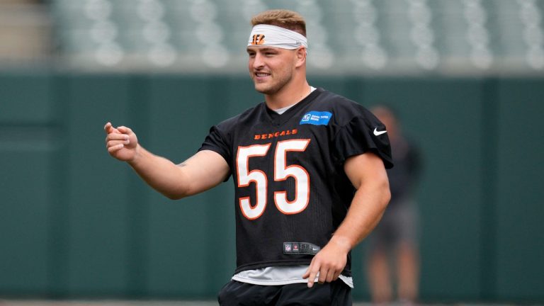 Cincinnati Bengals linebacker Logan Wilson (55) gestures during practice at the team's NFL football training facility. (AP Photo/Jeff Dean)