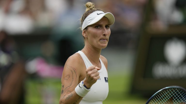 Czech Republic's Marketa Vondrousova celebrates a point against Tunisia's Ons Jabeur during the women's singles final on day thirteen of the Wimbledon tennis championships in London, Saturday, July 15, 2023. (Alastair Grant/AP)