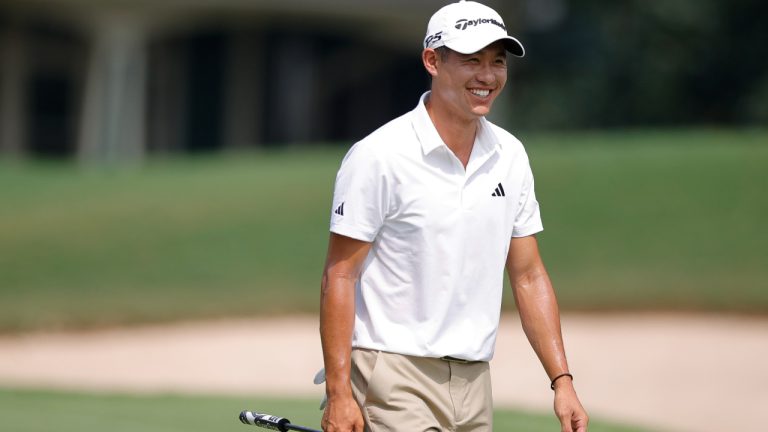 Collin Morikawa crosses the first fairway during the first round of the Tour Championship golf tournament at East Lake Golf Club, Thursday, Aug. 24, 2023, in Atlanta. (Alex Slitz/AP)