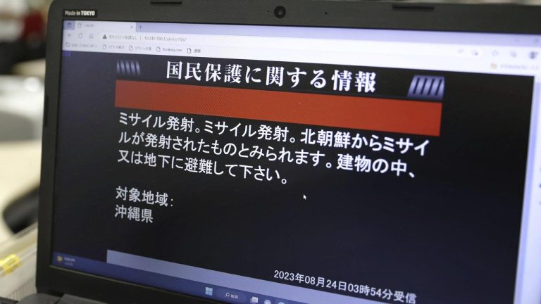 A monitor in Tokyo shows J-Alert or National Early Warning System to the residents in Okinawa, southern Japan, Thursday, Aug. 24, 2023. North Korea said Thursday that its second attempt to launch a spy satellite failed again but vowed to make another attempt in October, demonstrating willingness to endure flops to acquire a key military asset coveted by leader Kim Jong Un. The failed launch prompted neighboring Japan to issue brief a “J-alert” ordering some residents to evacuate to safe places as the North Korean rocket flew over its southernmost islands of Okinawa to the Pacific Ocean. The screen reads " Missile launched, Missile launched. It seems missile was launched from North Korea. Please take shelter inside buildings or underground. (Kyodo News via AP)