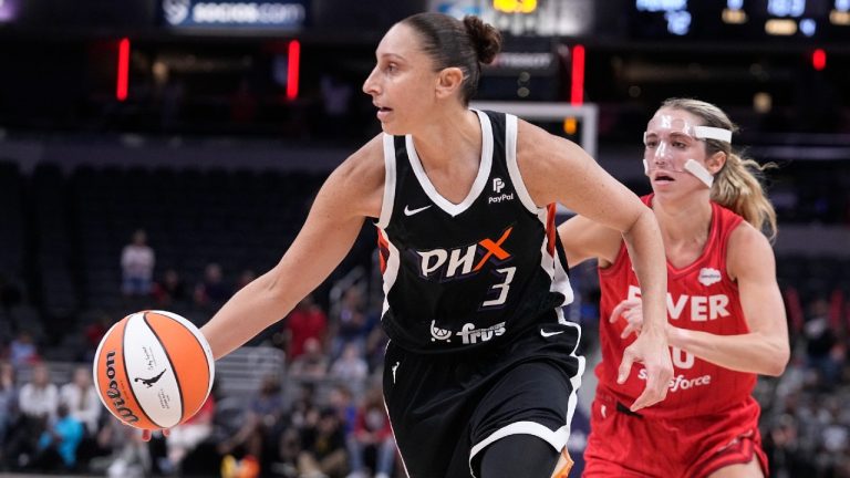 Phoenix Mercury's Diana Taurasi goes to the basket past Indiana Fever's Lexie Hull during the second half of a WNBA basketball game, Tuesday, Aug. 1, 2023, in Indianapolis. (Darron Cummings/AP)