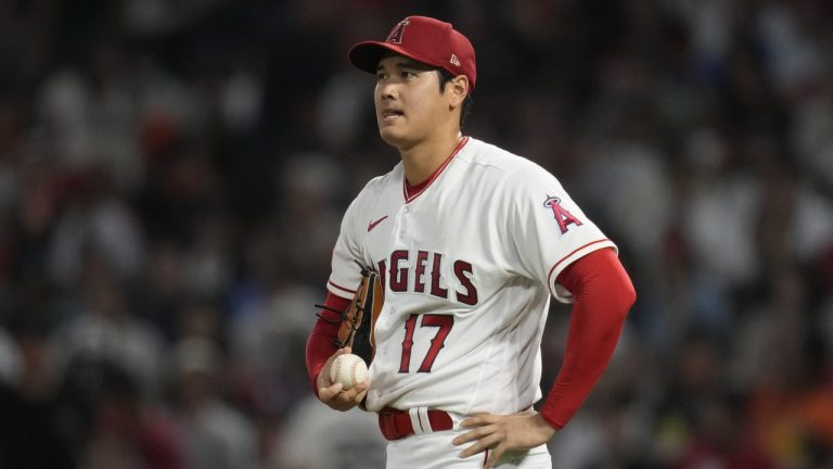 Los Angeles Angels starting pitcher Shohei Ohtani (17) reacts after hitting San Francisco Giants' Wilmer Flores with a pitch during the sixth inning of a baseball game in Anaheim, Calif., Wednesday, Aug. 9, 2023. (Ashley Landis/AP)