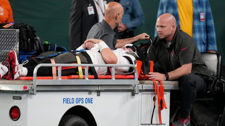 Tampa Bay Buccaneers quarterback John Wolford (11) is carted off the field during the second half of a pre-season game against the New York Jets. (Seth Wenig/AP)