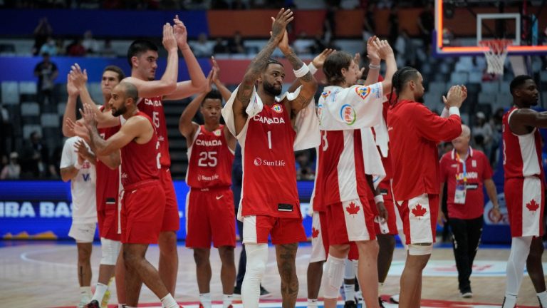 Team Canada celebrates after defeating Lebanon during the Basketball World Cup group H match between Canada and Lebanon at the Indonesia Arena stadium in Jakarta, Indonesia Sunday, Aug. 27, 2023. (Dita Alangkara/AP)