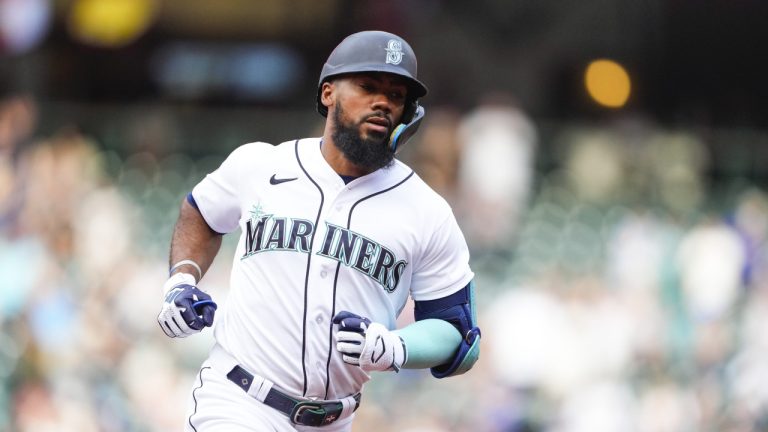 Seattle Mariners' Teoscar Hernandez jogs the bases after hitting a home run during a baseball game against the Washington Nationals, Tuesday, June 27, 2023, in Seattle. (Lindsey Wasson/AP)