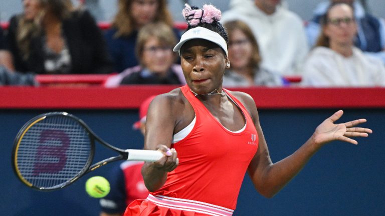 Venus Williams, of the United States, plays a shot to Madison Keys, of the United States, during their first round match against at the National Bank Open tennis tournament in Montreal, Monday, August 7, 2023. (Graham Hughes/CP)