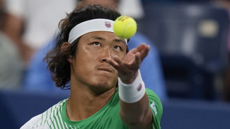 Zhizhen Zhang, of China, serves to Casper Ruud, of Norway, during the second round of the U.S. Open tennis championships, Wednesday, Aug. 30, 2023, in New York. (Charles Krupa/AP)