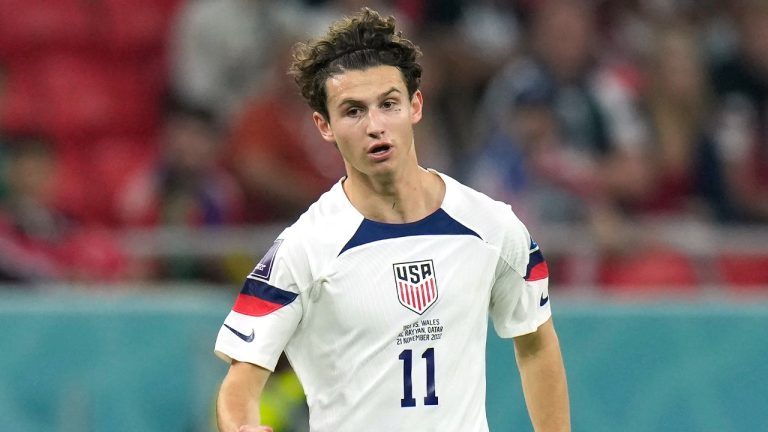 FILE - Brenden Aaronson of the United States in action during the World Cup, group B soccer match between the United States and Wales at the Ahmad Bin Ali Stadium in Doha, Qatar, Monday, Nov. 21, 2022. Aaronson will be one of the few players in Union Berlin’s squad to have played in Europe’s biggest and most important club competition when it begins in late September. (Francisco Seco/AP)