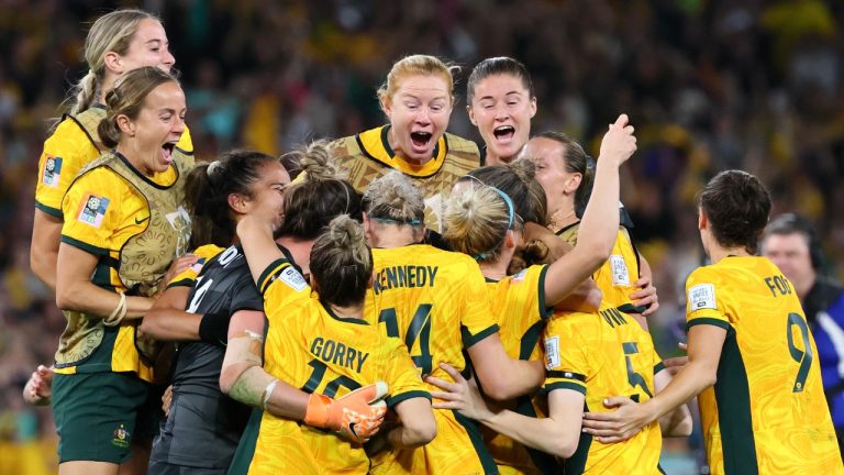 Australia players celebrate after winning the Women's World Cup quarterfinal soccer match between Australia and France in Brisbane, Australia, Saturday, Aug. 12, 2023. (Tertius Pickard/AP)