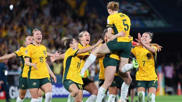 Australia players celebrate after winning the Women's World Cup quarterfinal soccer match between Australia and France in Brisbane, Australia, Saturday, Aug. 12, 2023. (Tertius Pickard/AP)