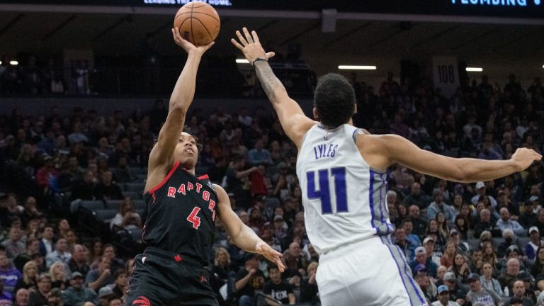 Toronto Raptors forward Scottie Barnes (4) shoots over Sacramento Kings forward Trey Lyles (41) during the first quarter of an NBA basketball game in Sacramento, Calif., Wednesday, Jan. 25, 2023. (Randall Benton/AP)