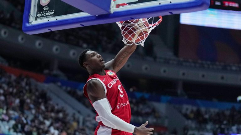 Canada forward RJ Barrett (9) dunks to score against Lebanon during the Basketball World Cup group H match between Canada and Lebanon at the Indonesia Arena stadium in Jakarta, Indonesia, Sunday, Aug. 27, 2023. (Dita Alangkara/AP)