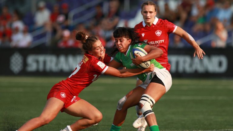 Canada's Chloe Daniels tackles Mexico's Maria Fernanda Tovar during women's rugby action at the Rugby Sevens Paris 2024 Olympic qualification event at Starlight Stadium in Langford, B.C., on Saturday, August 19, 2023. (Chad Hipolito/CP)