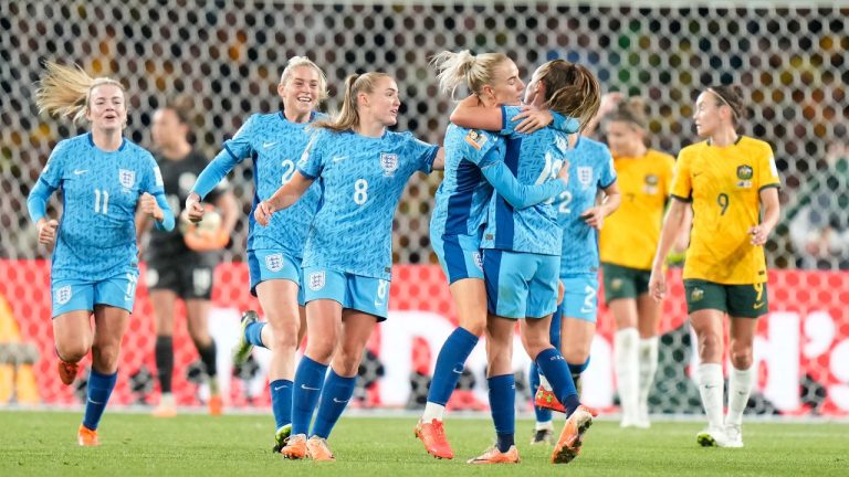 England players celebrate after England's Ella Toone scored her side's opening goal during the Women's World Cup semifinal soccer match between Australia and England at Stadium Australia in Sydney, Australia, Wednesday, Aug. 16, 2023. (Alessandra Tarantino/AP Photo)