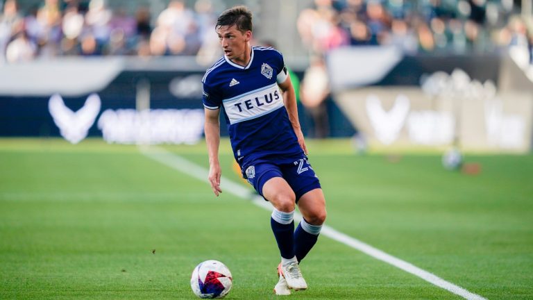 Vancouver Whitecaps midfielder Ryan Gauld (25) surveys the field during the first half of an MLS soccer match against the Los Angeles Galaxy, Sunday, July 30, 2023, in Carson, Calif. (Ryan Sun/AP)