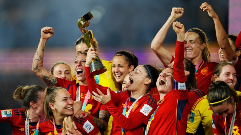 Spain's Esther Gonzalez holds the trophy celebrating at the end of the Women's World Cup soccer final between Spain and England at Stadium Australia in Sydney, Australia, Sunday, Aug. 20, 2023. Spain won 1-0. (Abbie Parr/AP)