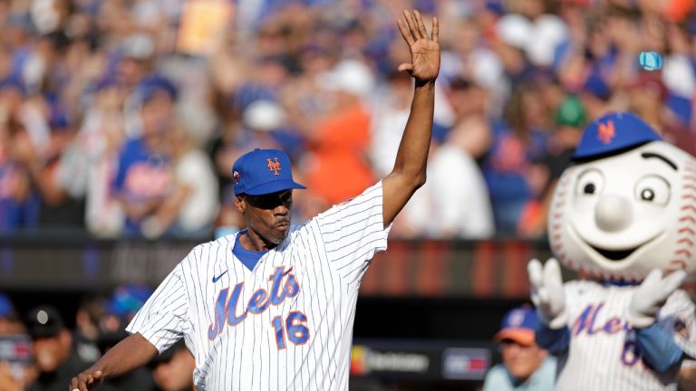 Former New York Mets player Dwight Gooden waves as he is introduced during an Old-Timers' Day ceremony before a baseball game between the Colorado Rockies and the Mets, Saturday, Aug. 27, 2022, in New York. (Adam Hunger/AP)